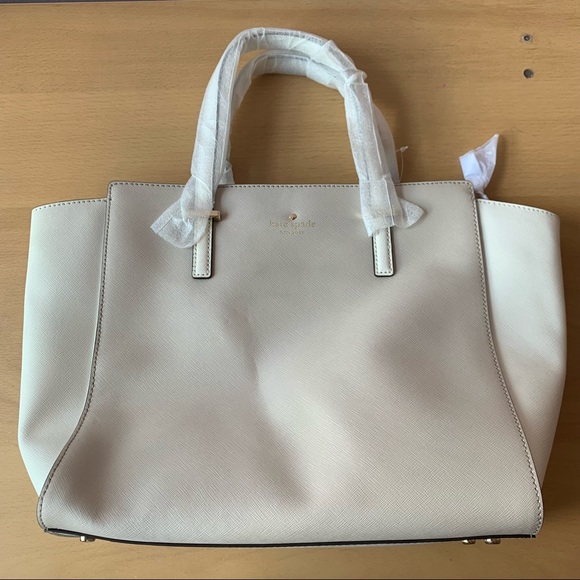 Brand New Kate Spade Beige and White Genuine Leather...